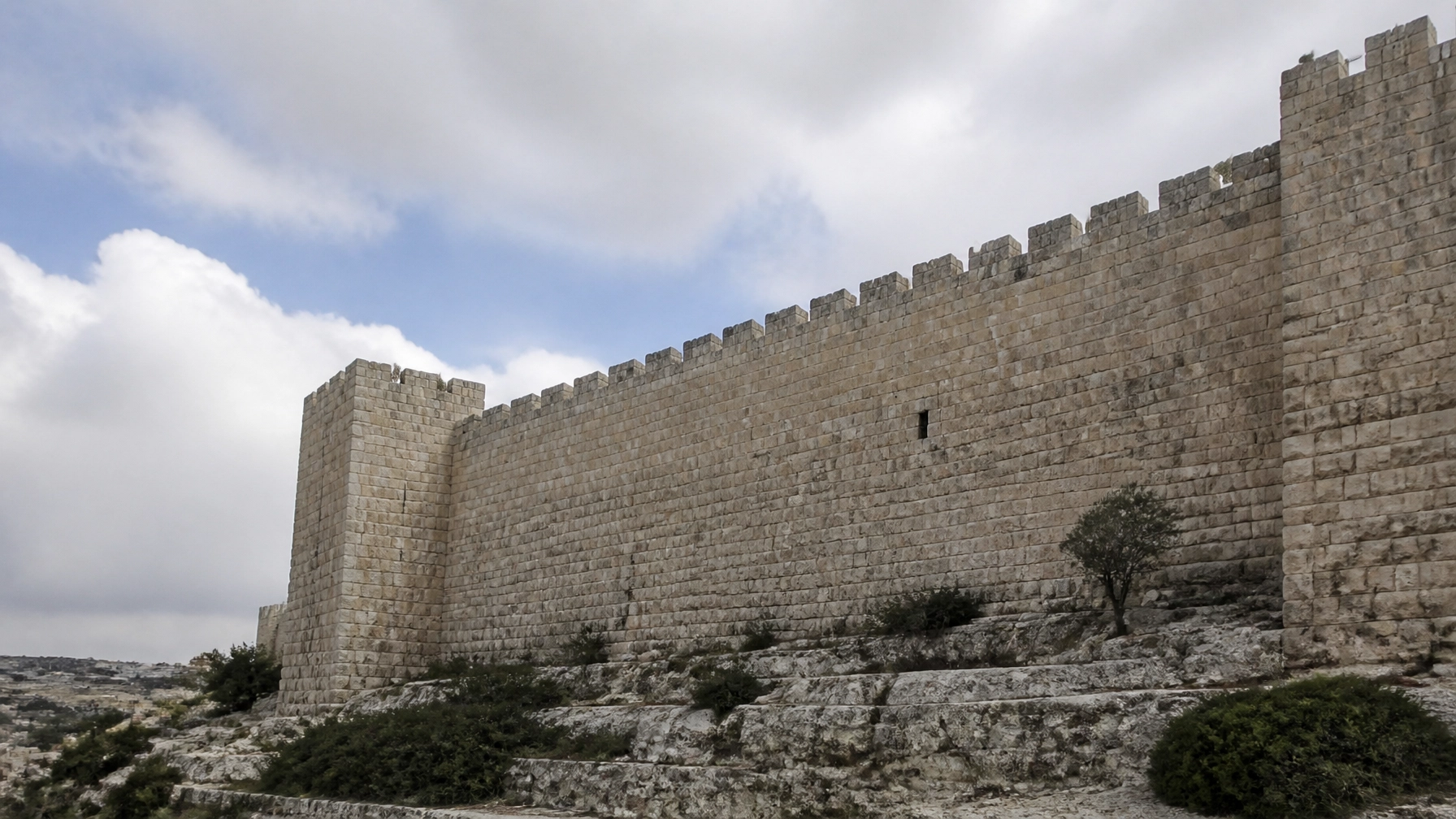 Strong ancient stone wall showing protection and self-control like a guarded city